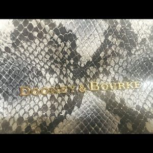 Dooney & Bourke snake skin leather purse. Medium size. Shoulder and hand carry.